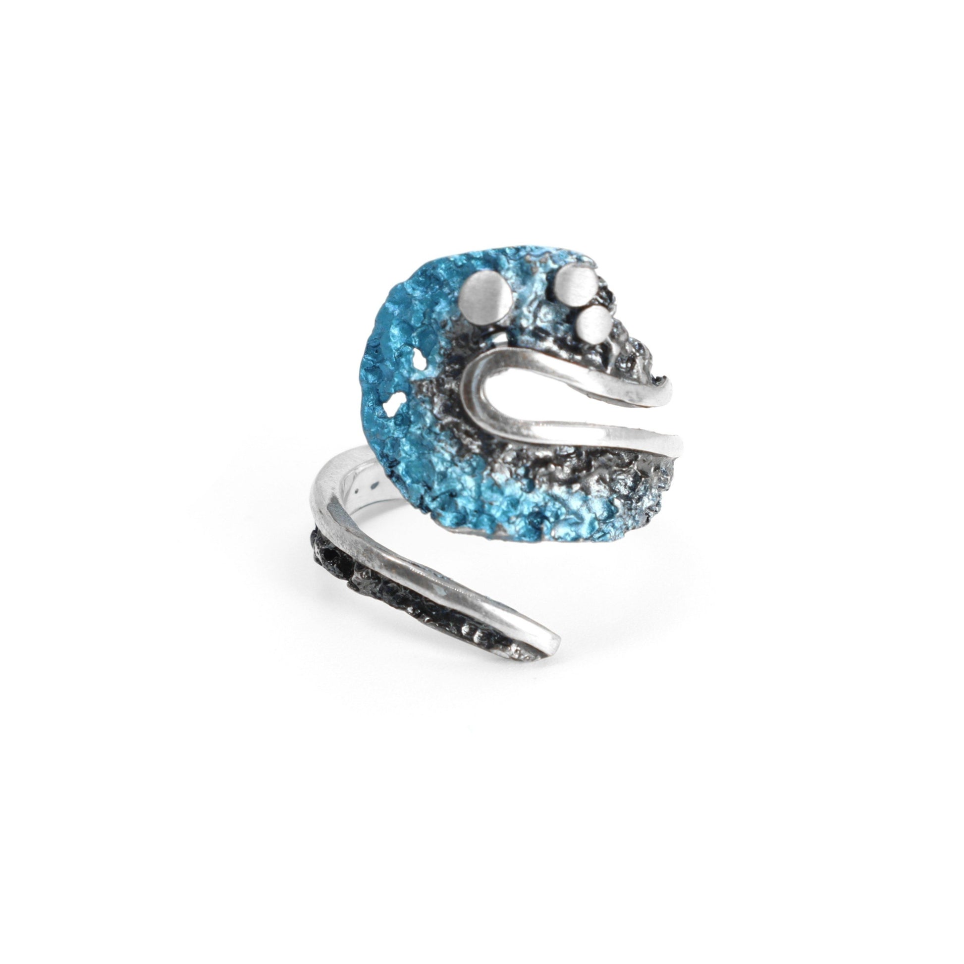 sterling silver stingray wrap around ring with natural blue pigment. 